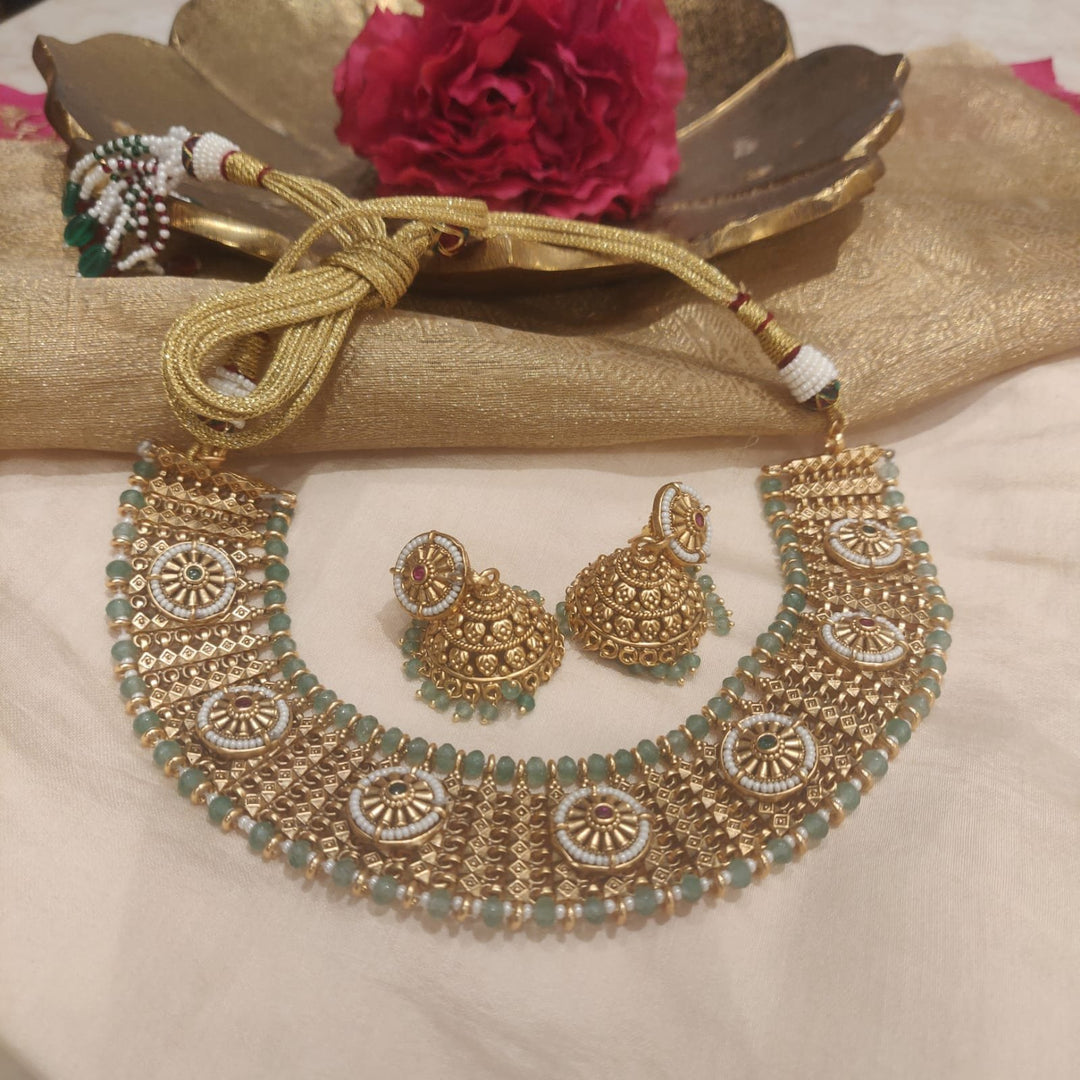 Captivating Glamorous Refined bridal sky moti and golden necklace