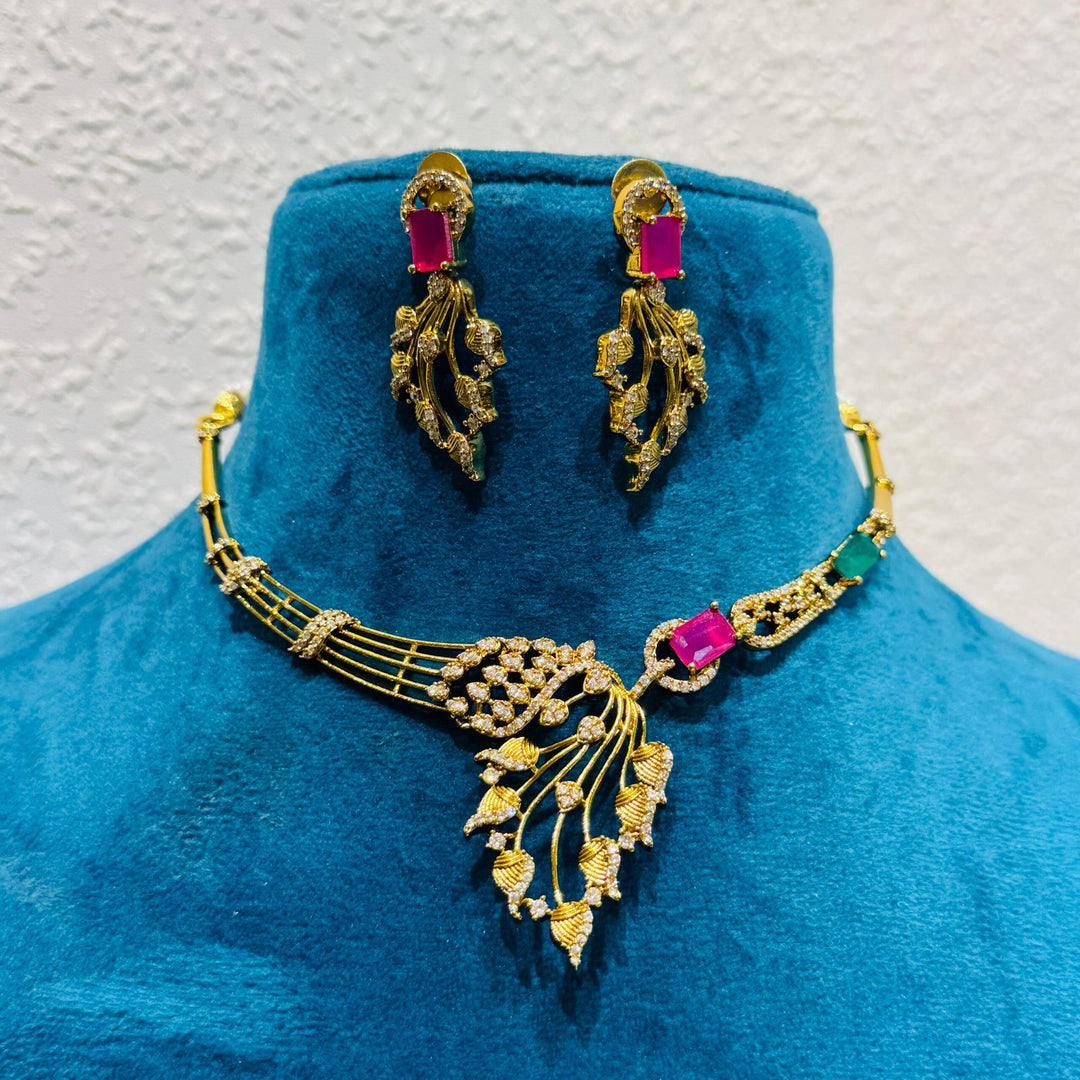 Precious ruby and green stone with leafy design golden choker necklace