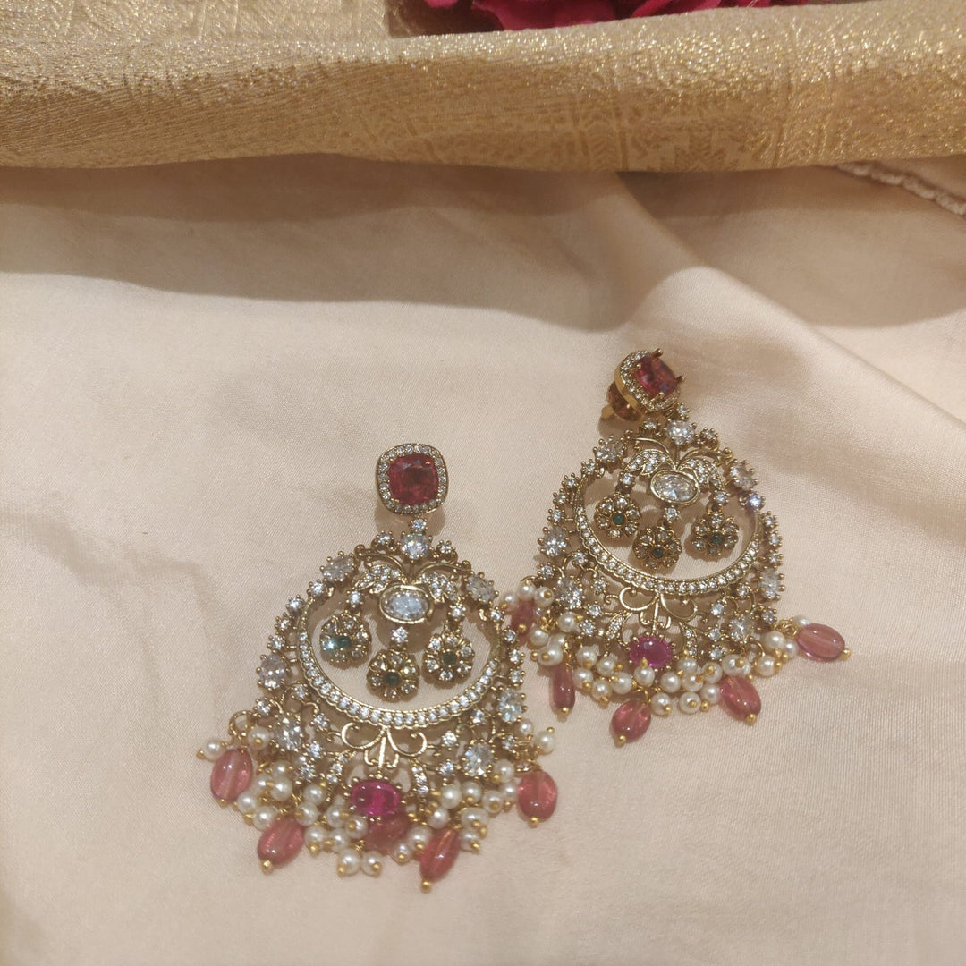 Resplendent Enigmatic ad stone and ruby stone jhumka earring
