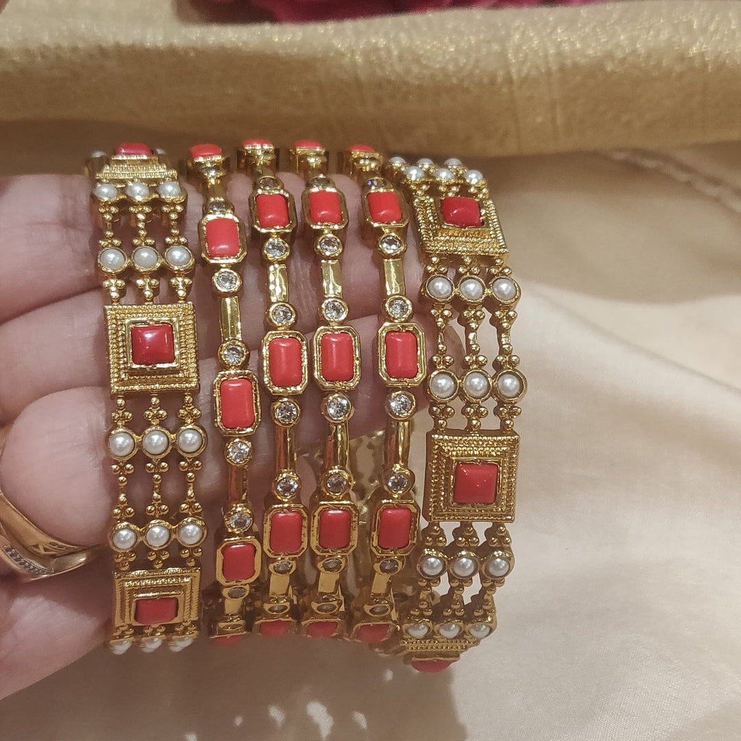 Rare orange  with pearls  and golden bangels