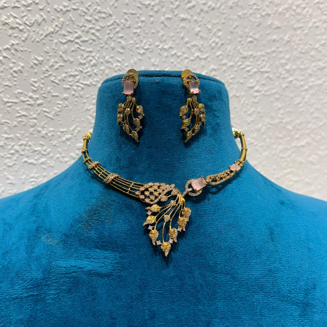 Posh Precious pink rose stone with leafy design golden choker necklace