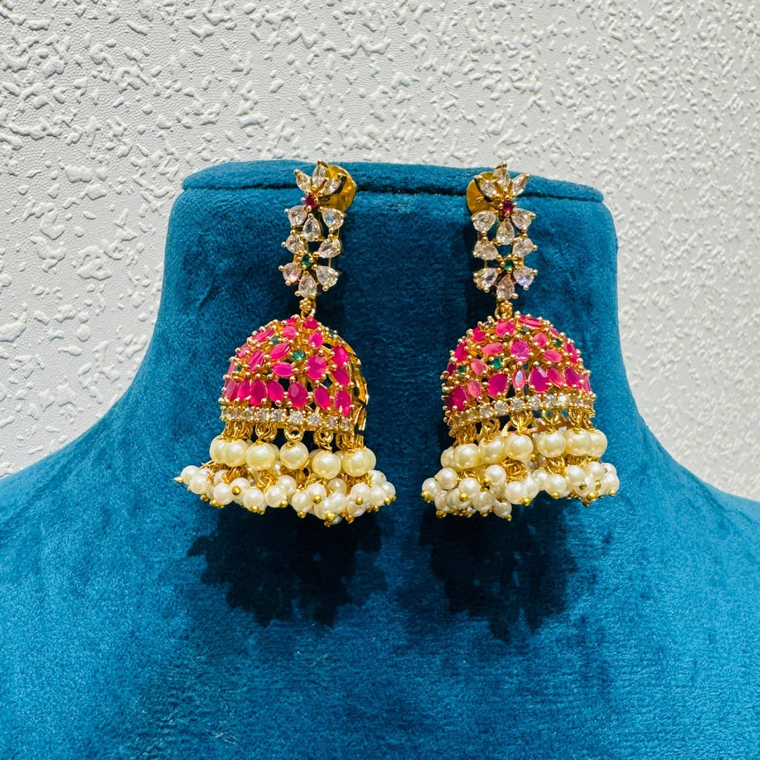 Inimitable Scintillating jelly fish design with pink stone and golden moti jhumka earring