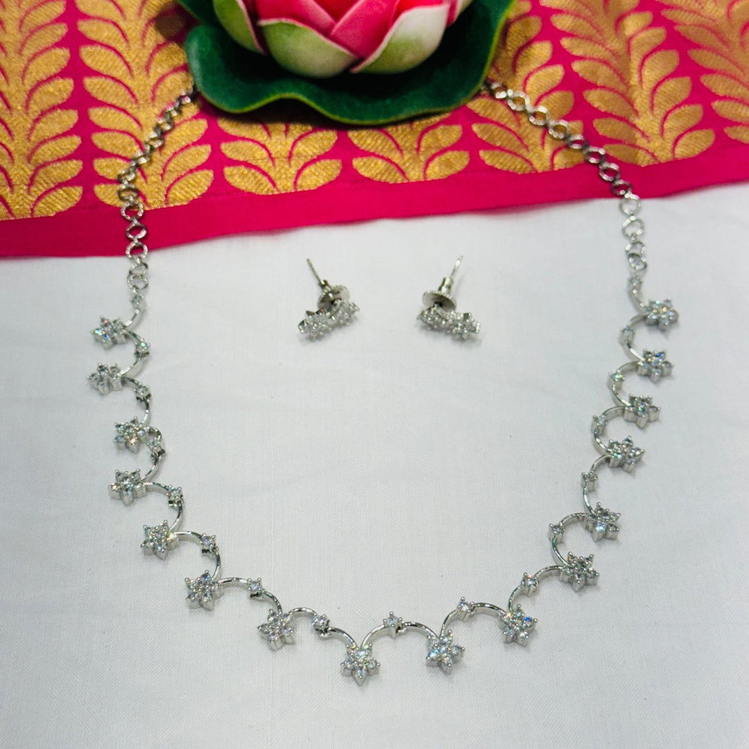 Regal floral design ad stone with chain necklace