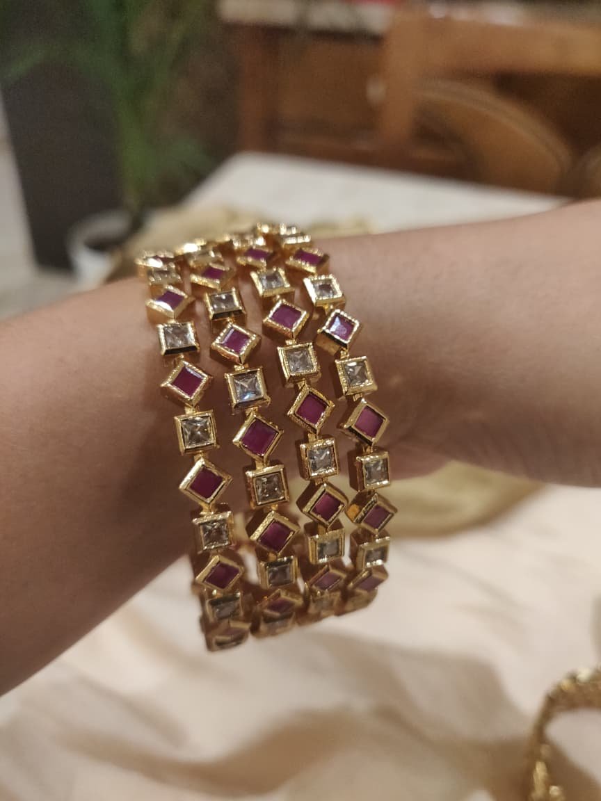 Dazzling b box design ad crystal ruby stone bangles