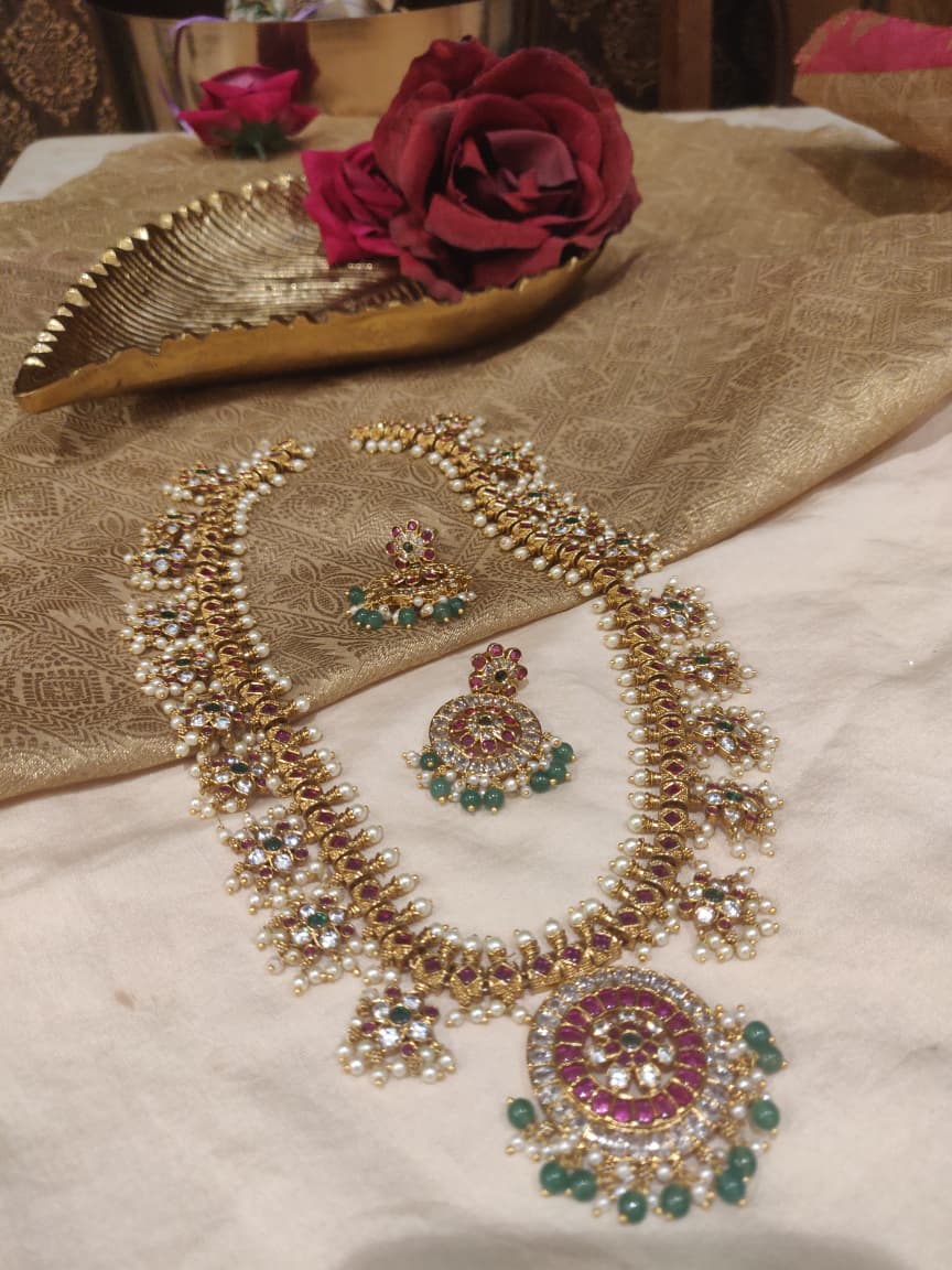 Radiant Floral Long Necklace with White Beads