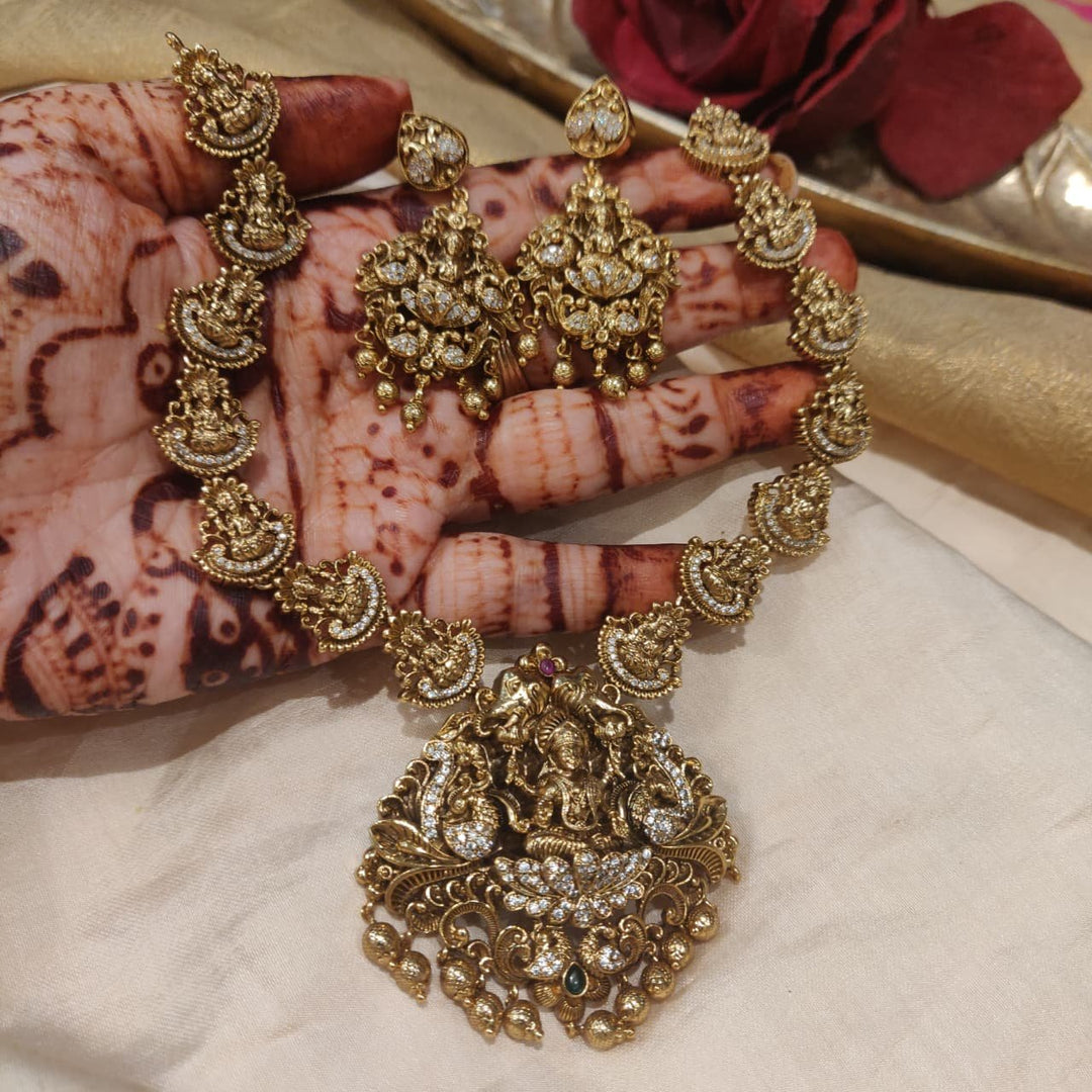 Lustrous Temple Necklace With Golden Beads