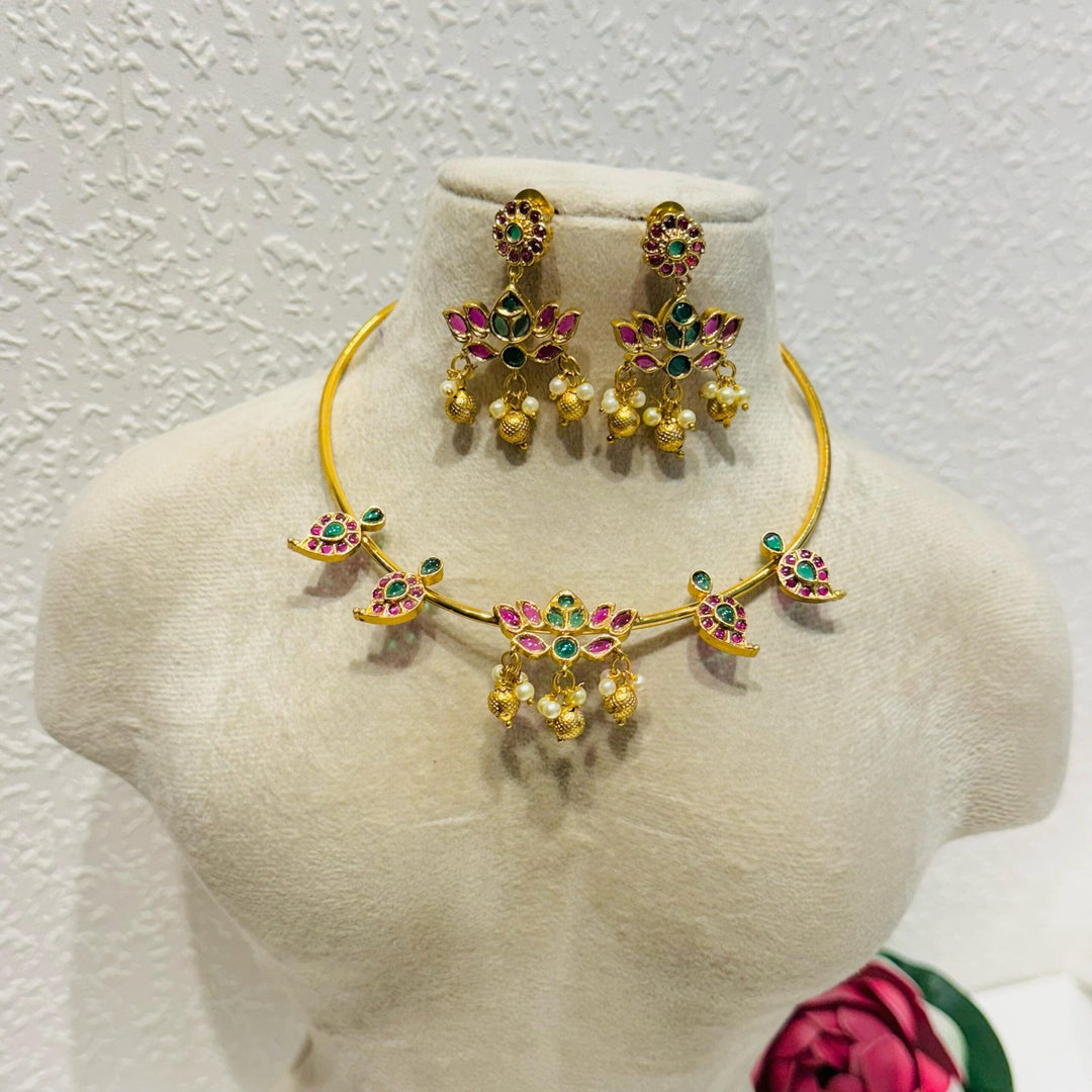 Sought lotus design with pearls golden moti and pipe choker necklace