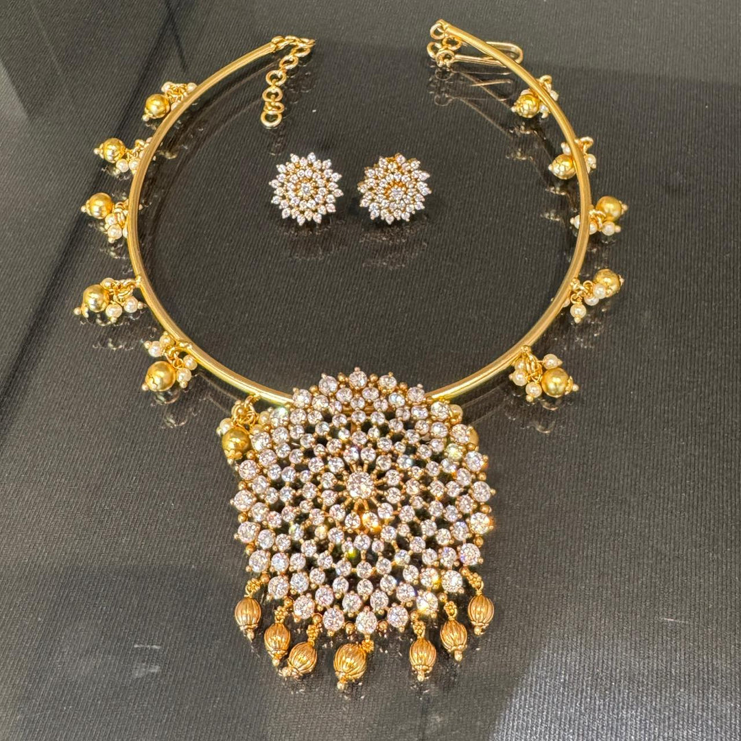 Lustrous Crystal Floral AD Stone Necklace with Golden beads
