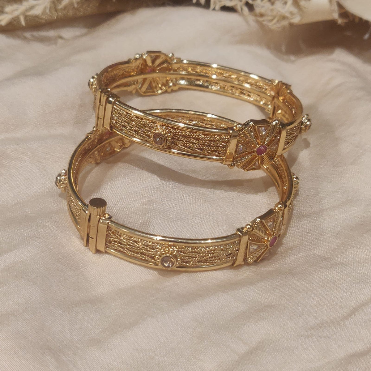 Timeless floral golden bangles set of 2