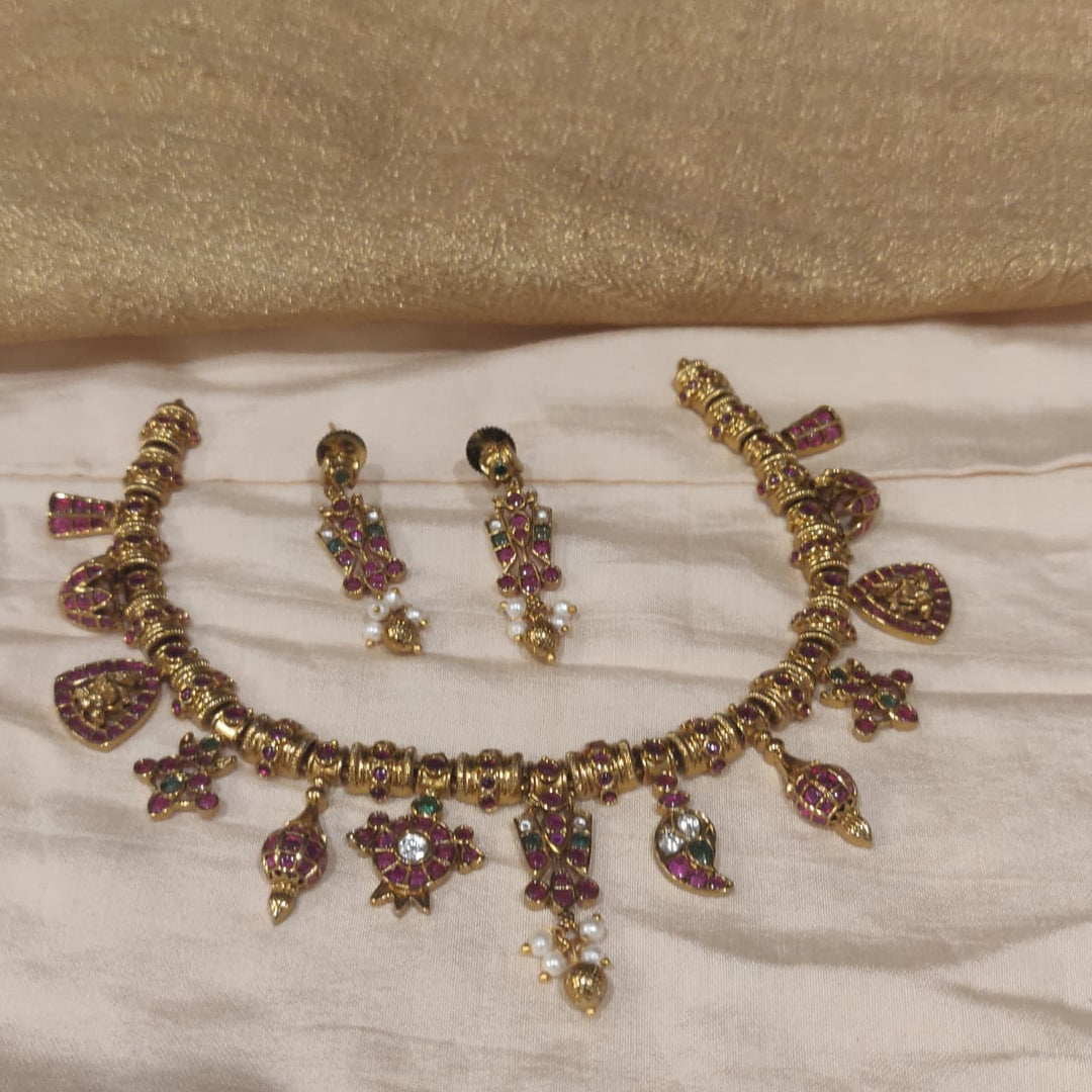 Captivating Ruby Stone Droplet Golden Necklace