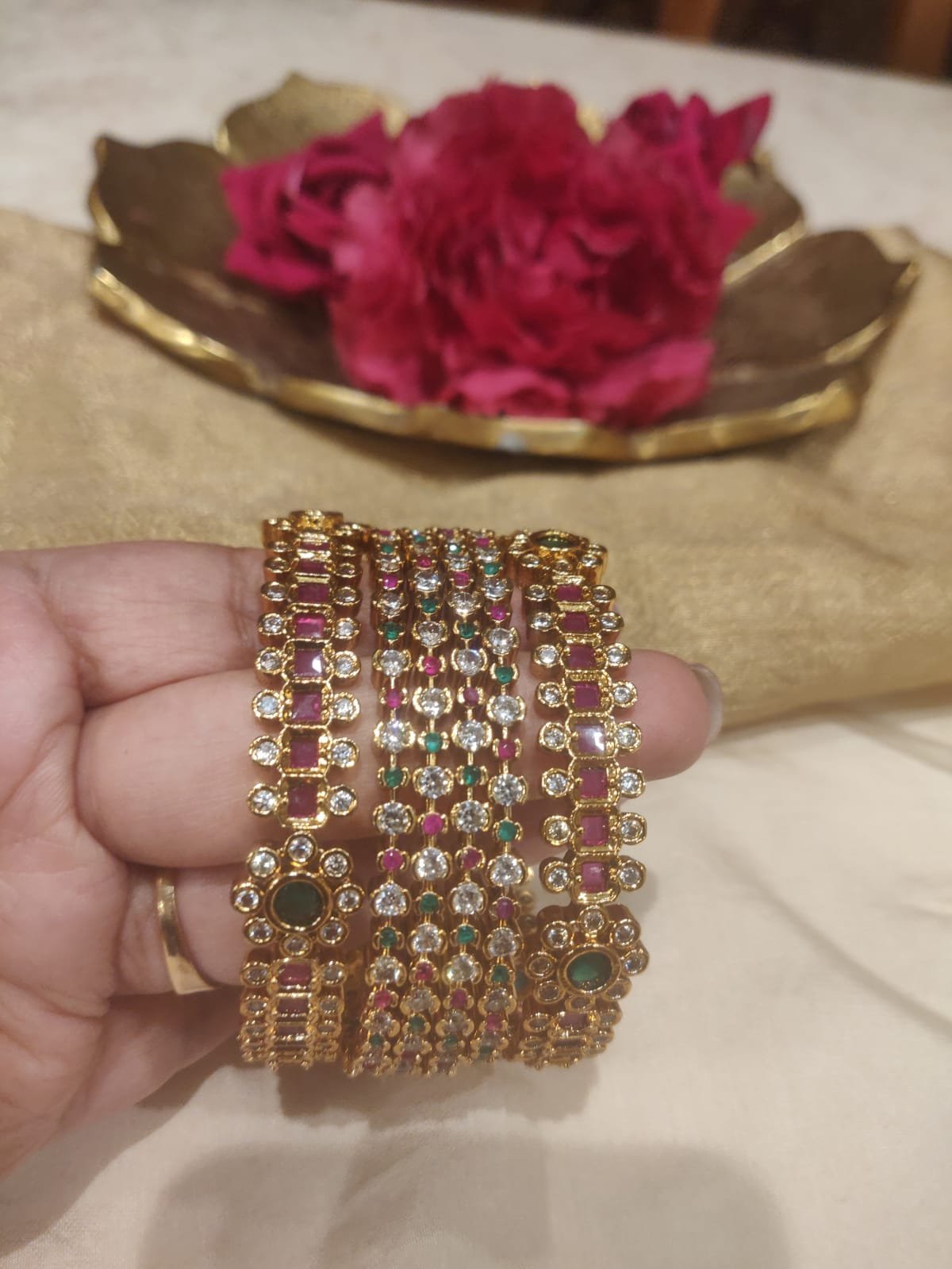 Floral ruby green stone golden set