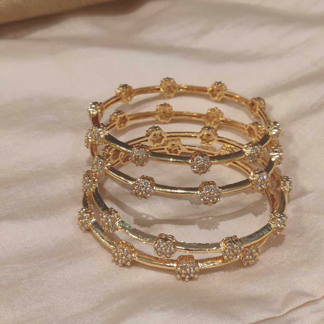 Lustrous Golden Floral AD Stone Bangles set of 4