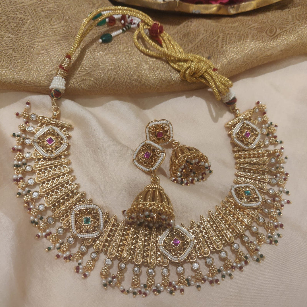 Opulent BRIDALGOLDEN DESIGIN WITH AD STONE AND CHOKER NECKLACE