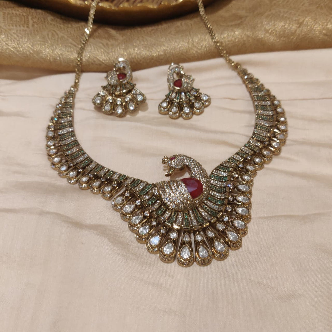 Radiant Green Ruby AD Peacock Necklace with Droplet Kundan Stones