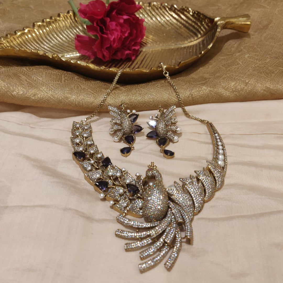 Timeless AD Crytsal Purple Stone Peacock Necklace