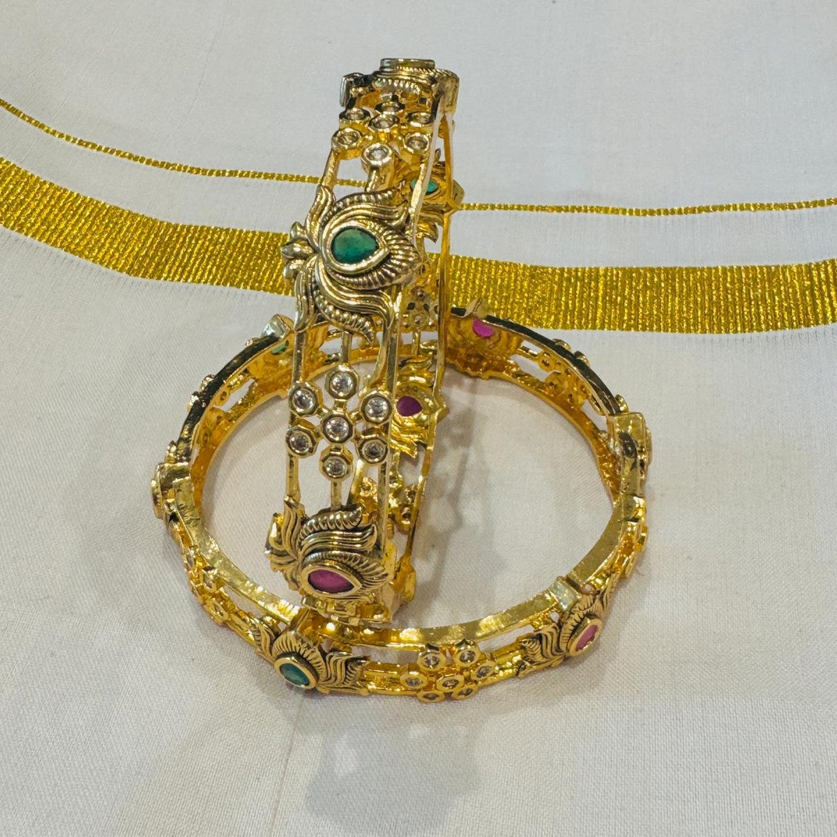 Antique gold finish temple bangles (set of 2)