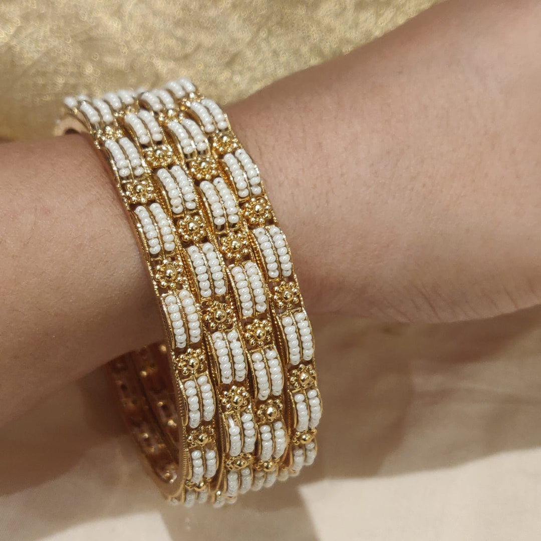 Opulent Golden Floral Pearl Bangle set of 2