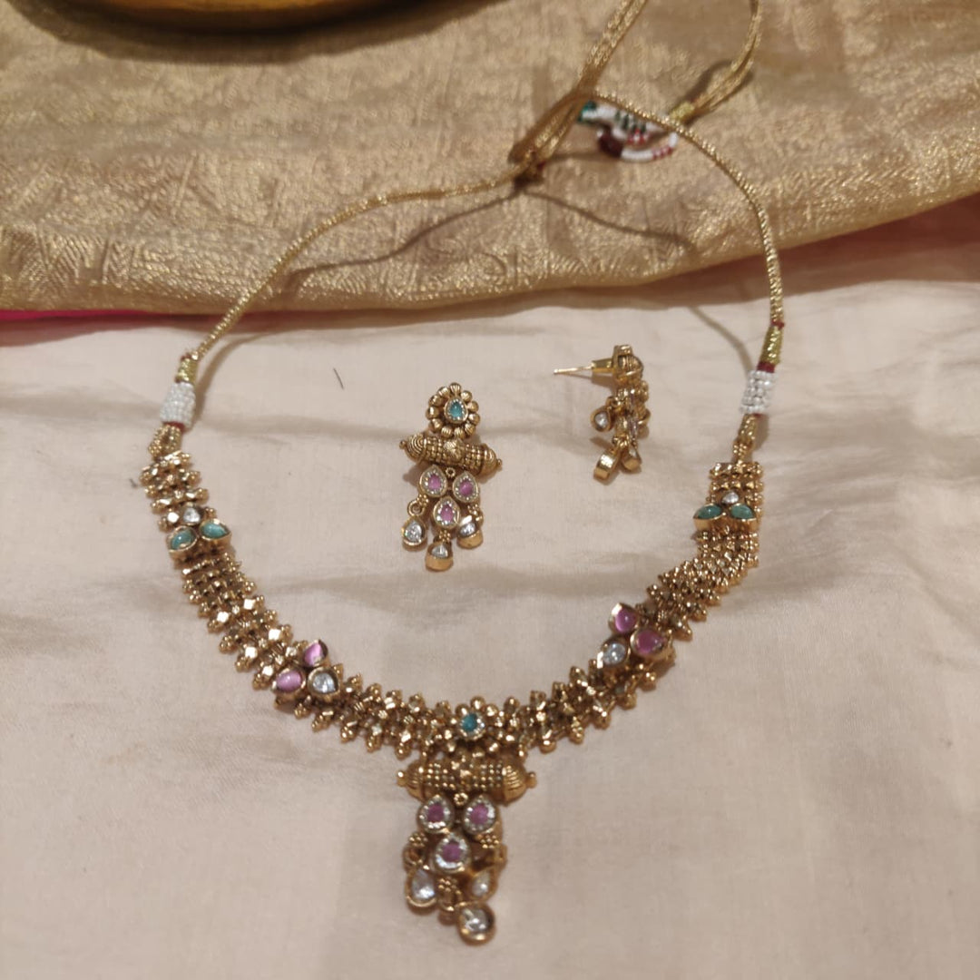 Inimitable Mint Pink AD Stone Short Golden Necklace