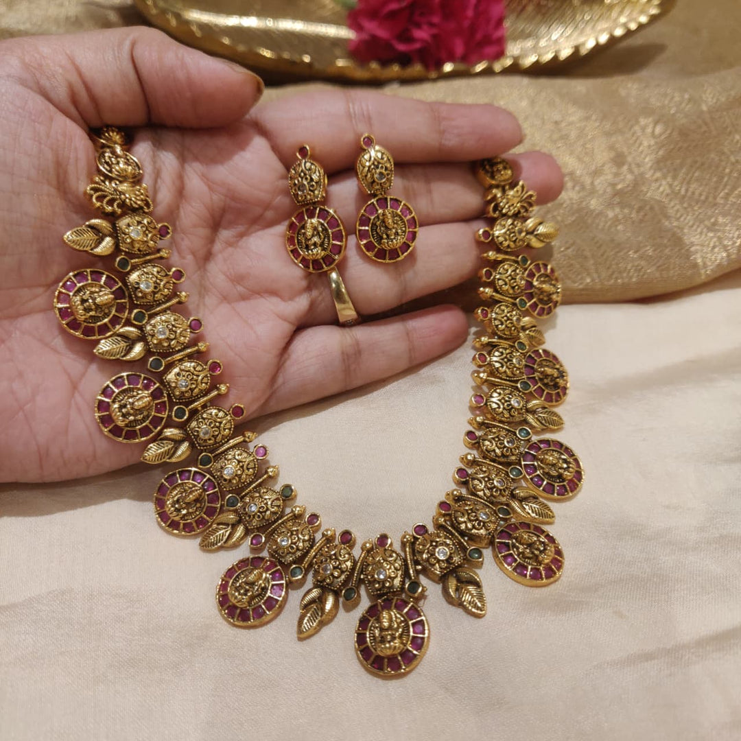 Glamorous Floral Coin Lakshmi Ruby AD Stone Necklace