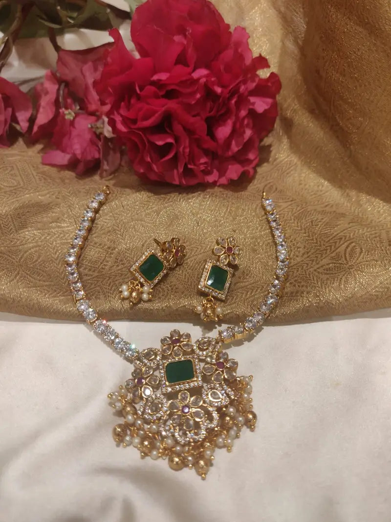 Exotic floral art design green stone fitted kundan short necklace