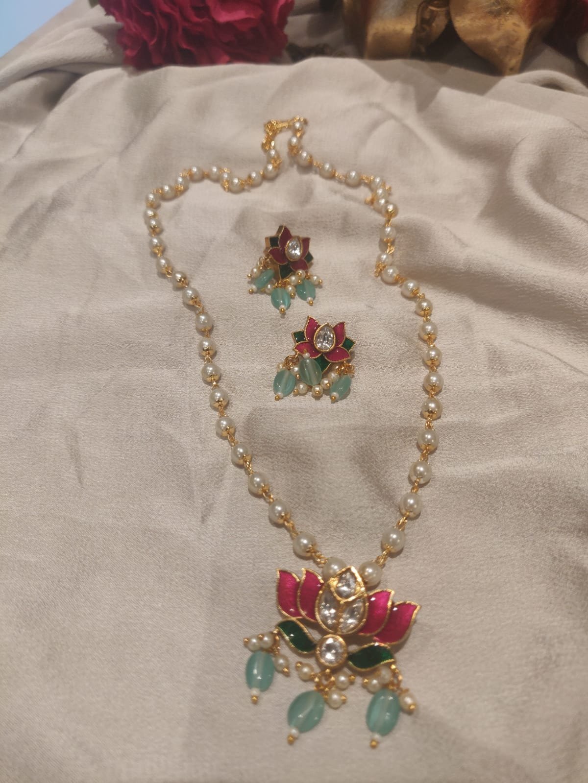 Handcrafted blue beads styled meenakari lotus pendant pearl necklace