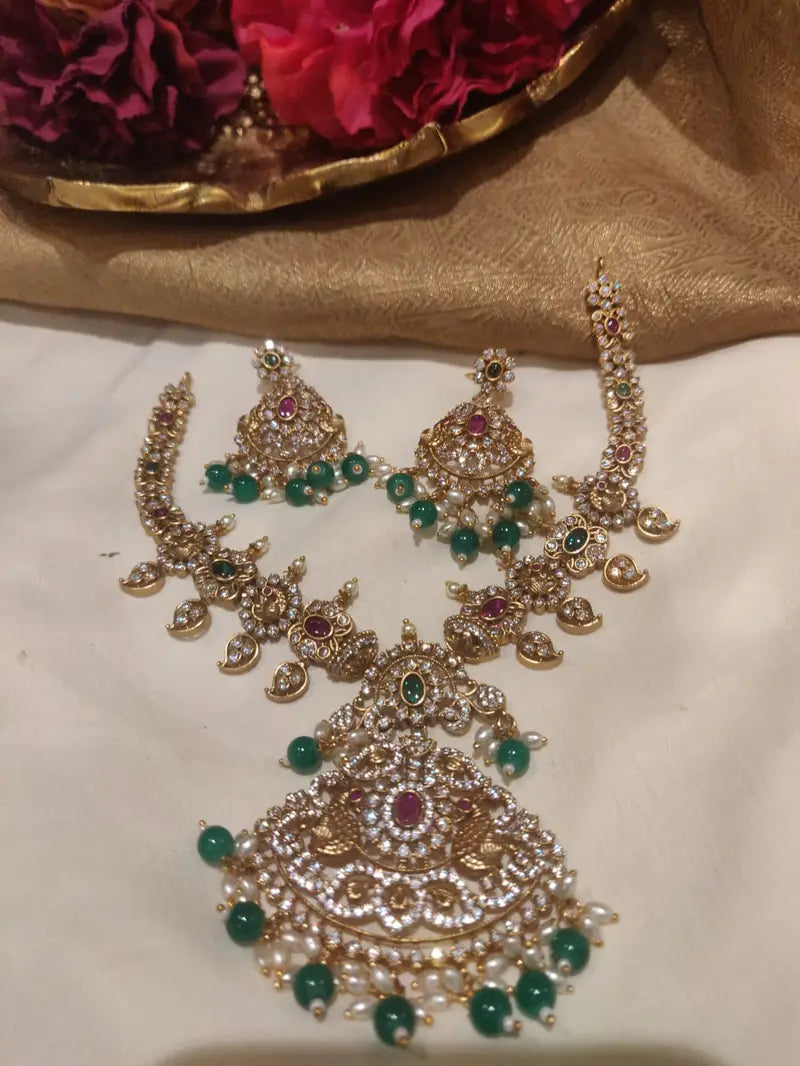 Majestic Peacock Design Dual Colored Stone Fitted Gold Finish AD Short Necklace