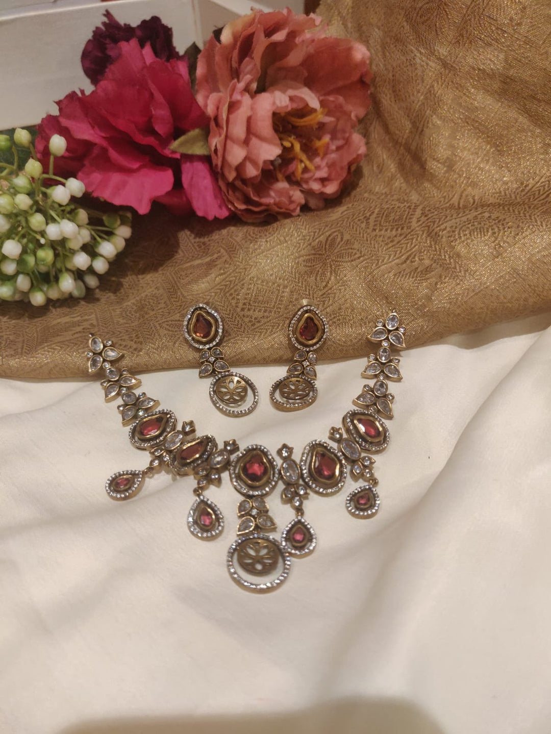 Alluring Antique Finish Red Stone Fitted AD Short Necklace