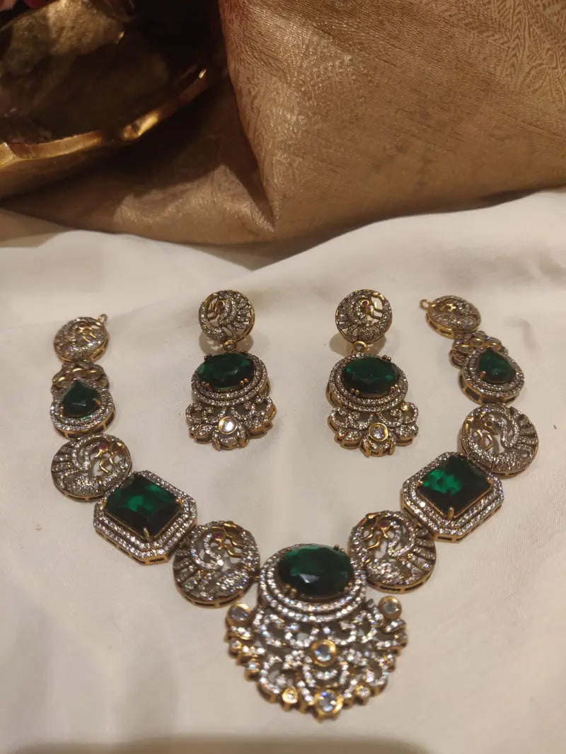 Ornate green stone styled antique finish ad fitted short necklace