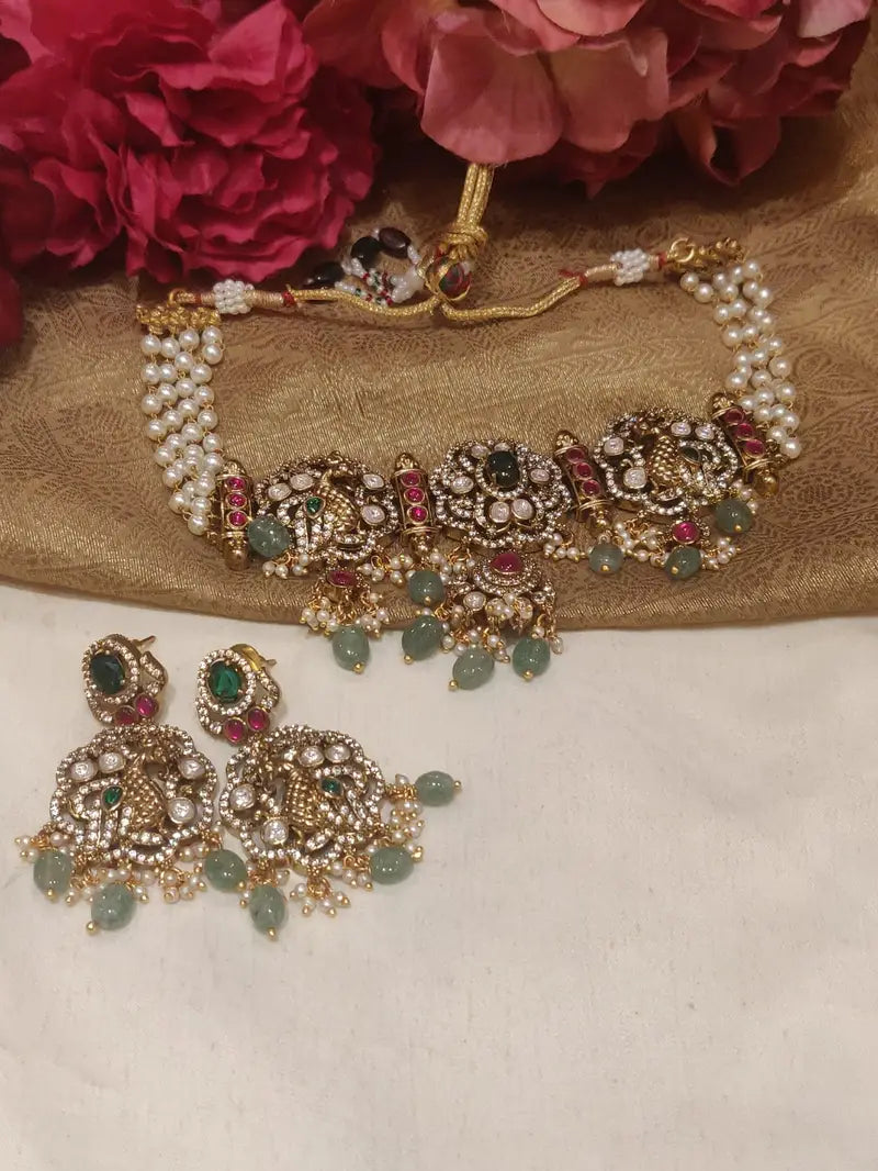 Enchanting handcrafted peacock design kundan pearl choker