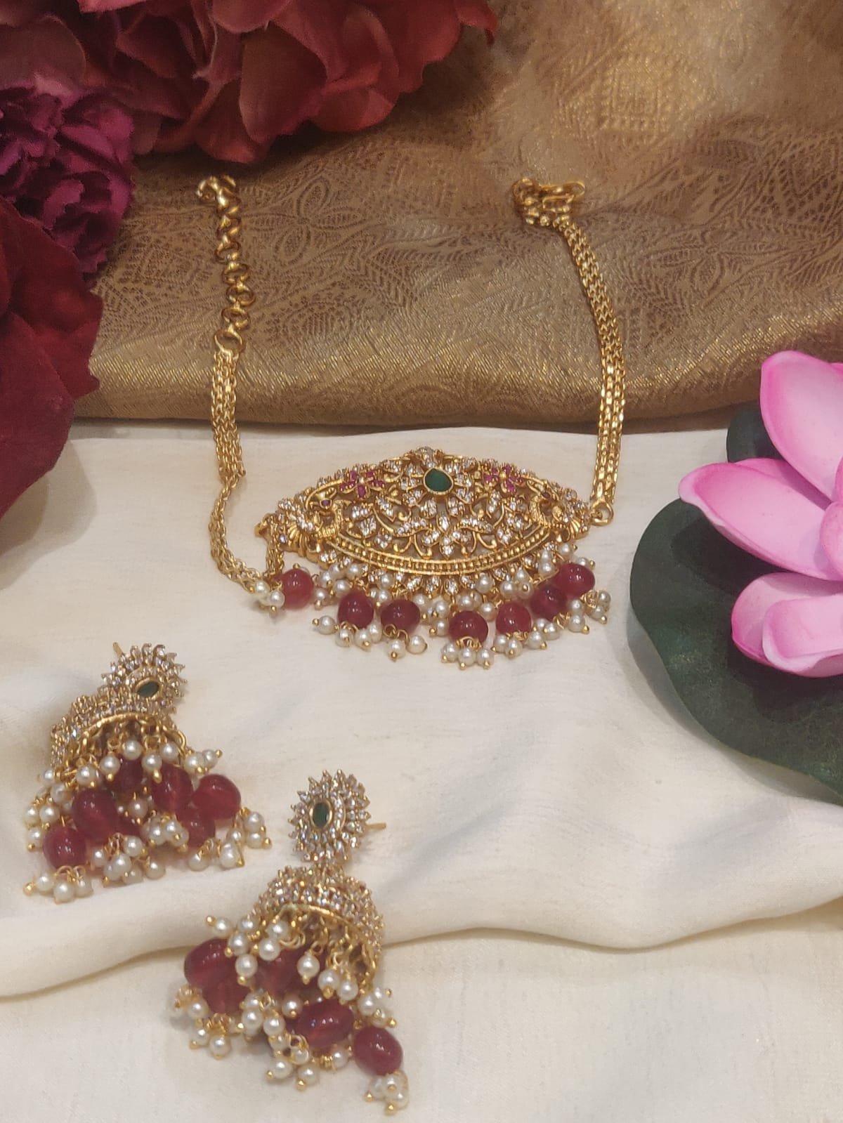 Opulent gold plated peacock design red beads styled ad chain choker