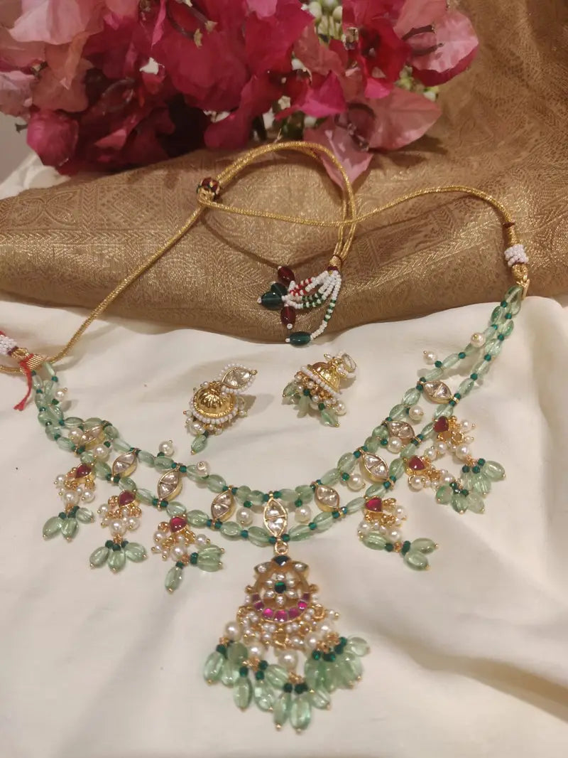 Opulent handcrafted crystal green beads layered necklace