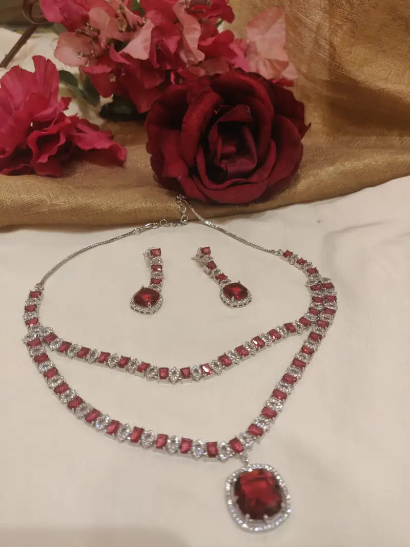 Lustrous silevr finish red stone styled pendant layered necklace ad