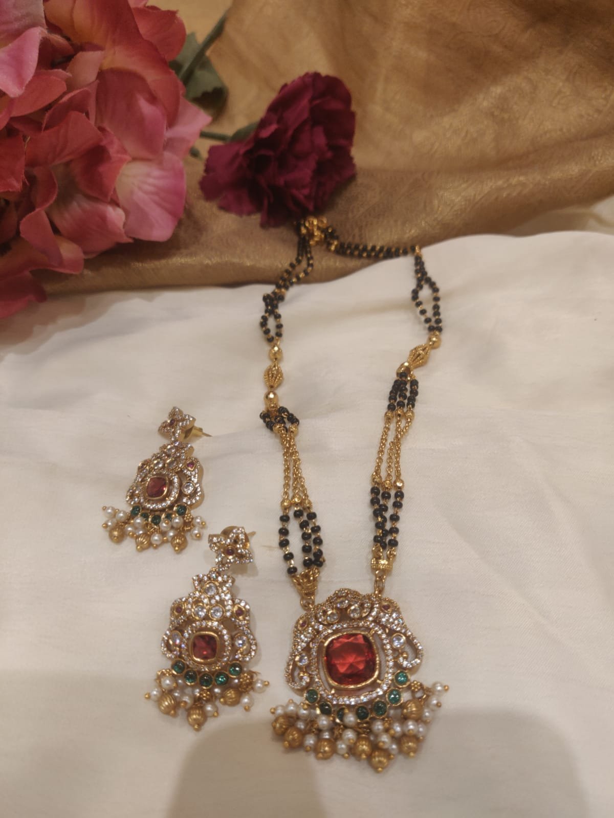 Ornate elephant design red stone styled ad bridal mangalsutra