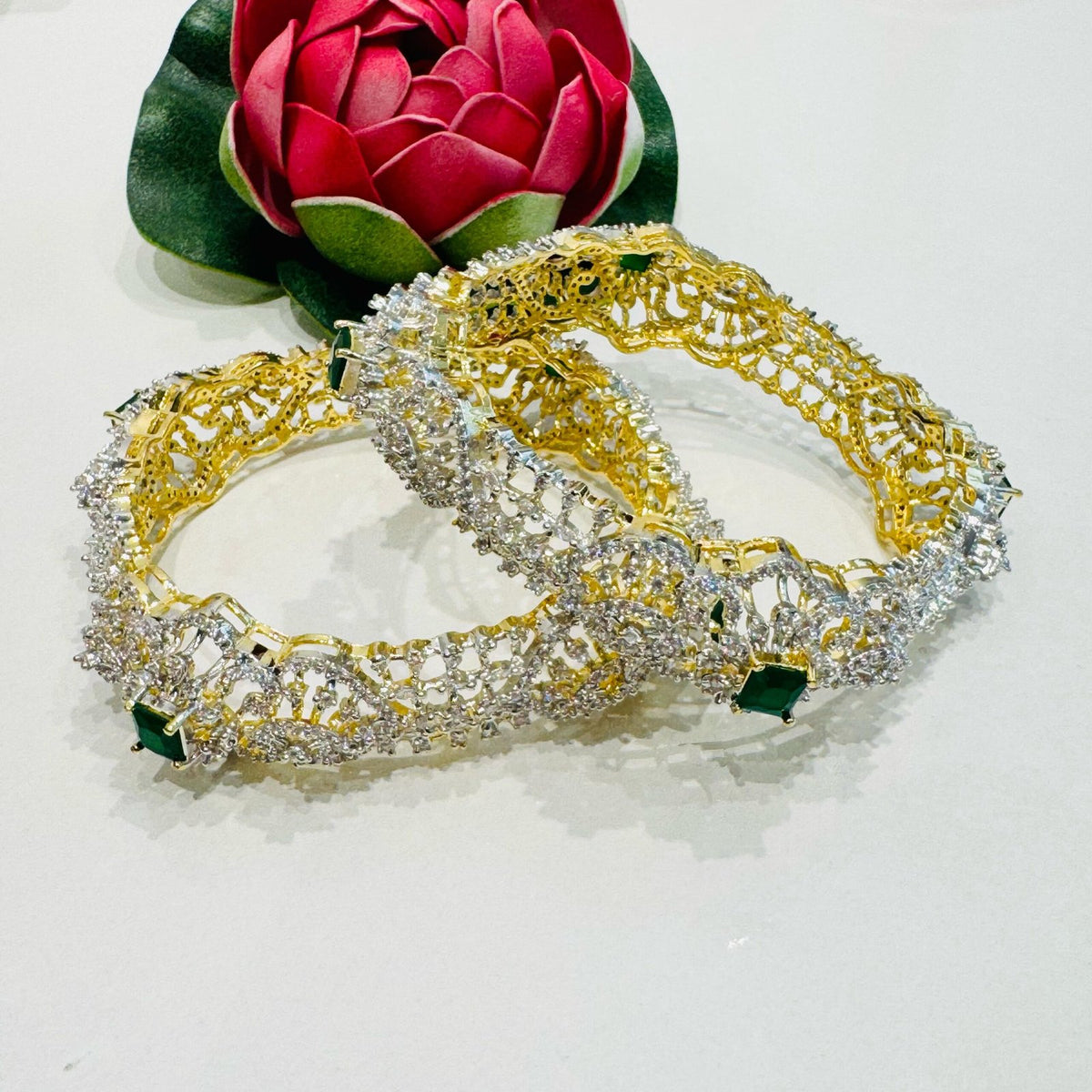 Elegant dazzling emerald  stone with ad stone gold and silver design bangels