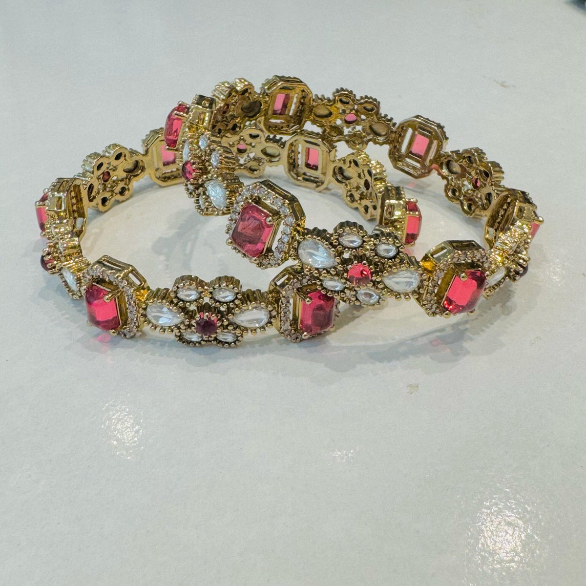 Floral design red blood golden bangels