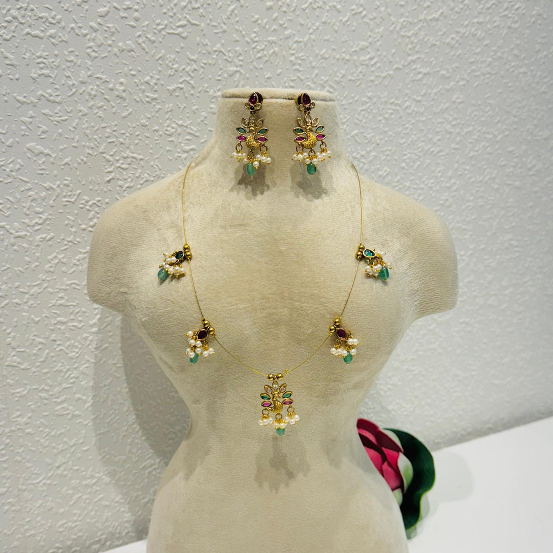 Swan emerald ruby golden chain