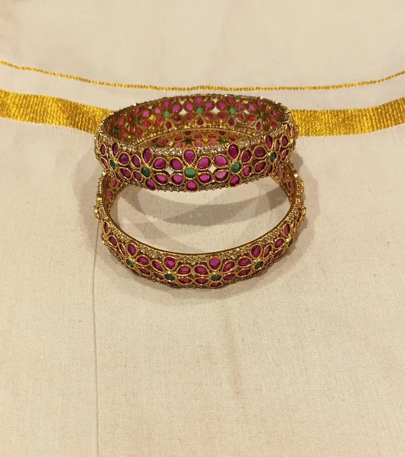 Traditional ruby stone floral gold bangles set