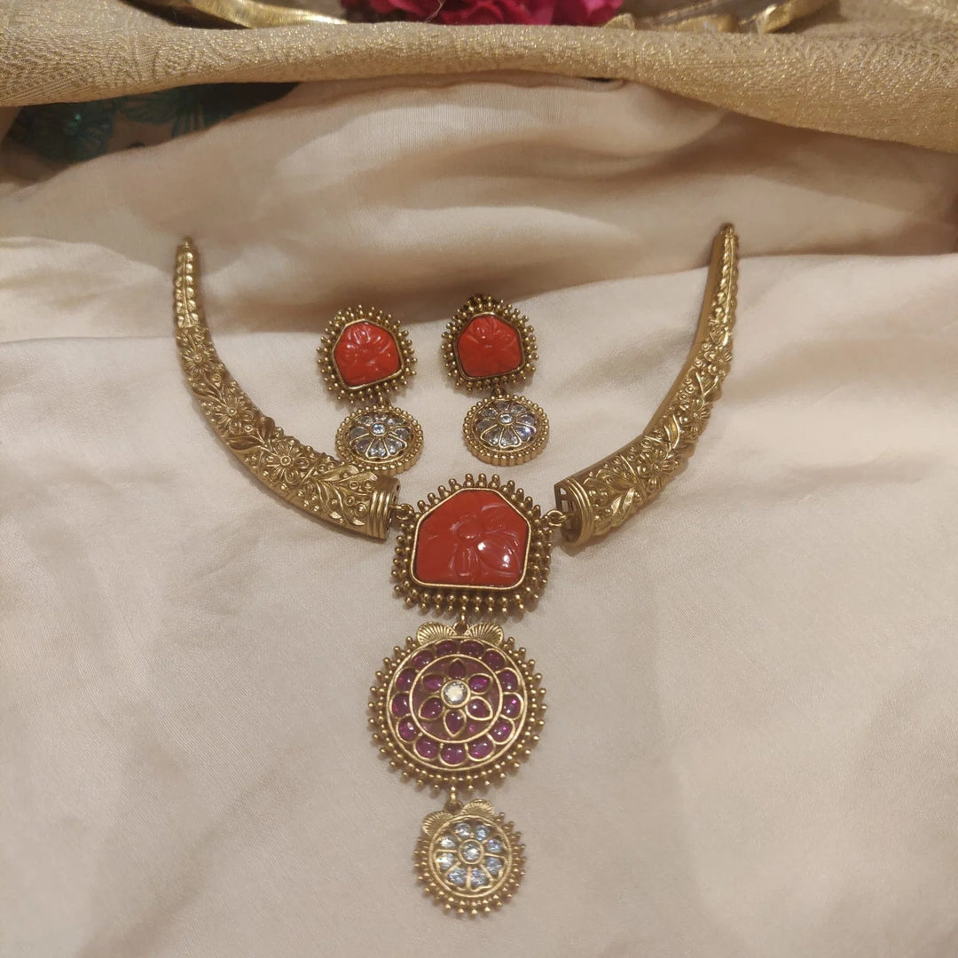 Divine Mesmerizing orange  stone with golden choker necklace