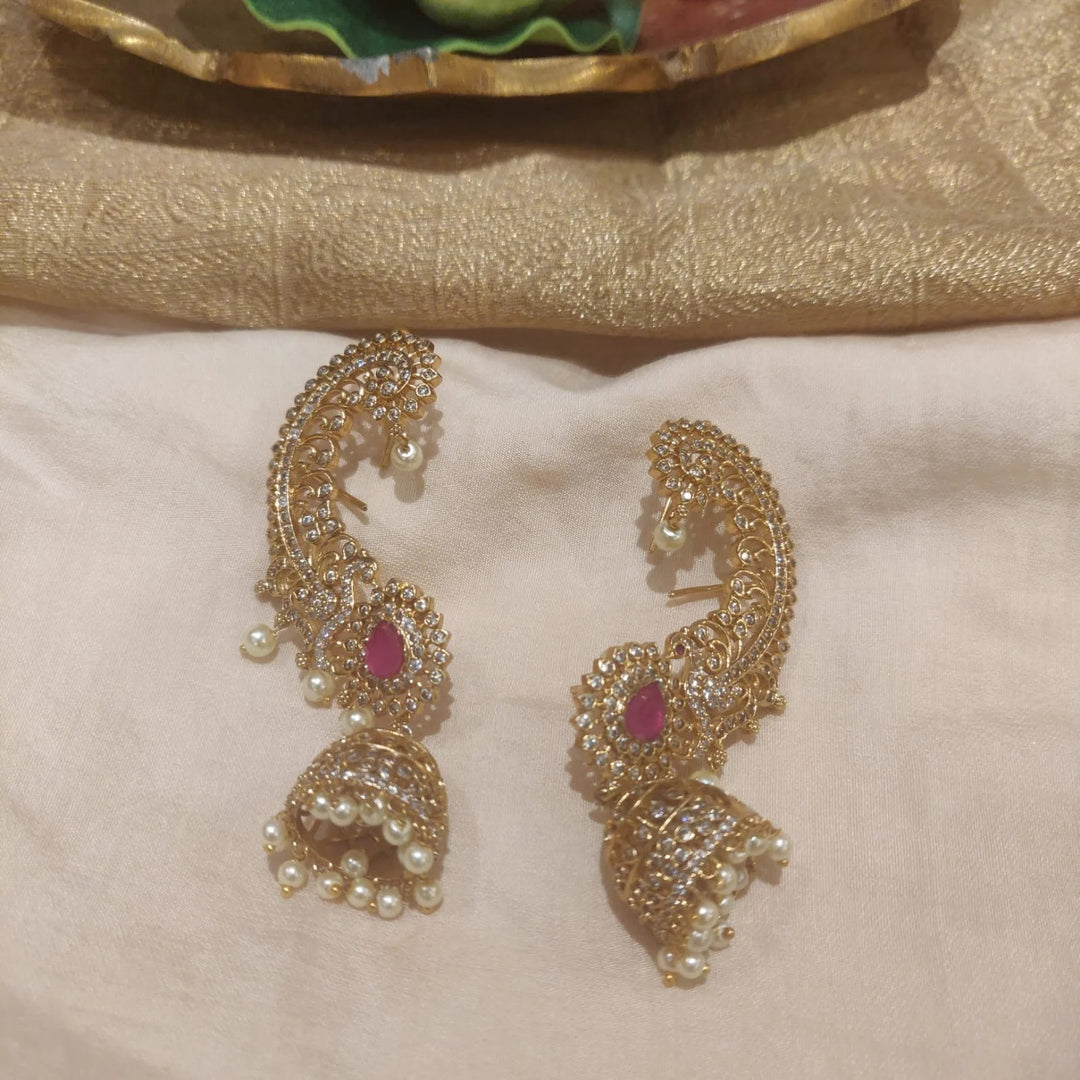 Grand sea horse design with pearls and ruby stone jhumka earring